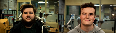 Two males in engineering workshop
