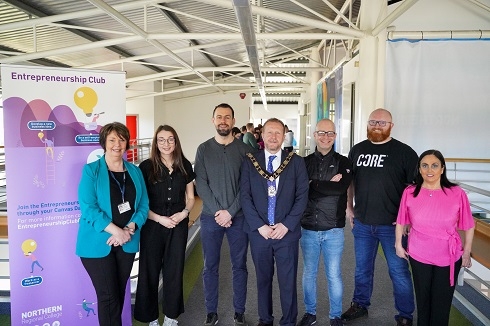 The mayor and group of staff and guest speakers