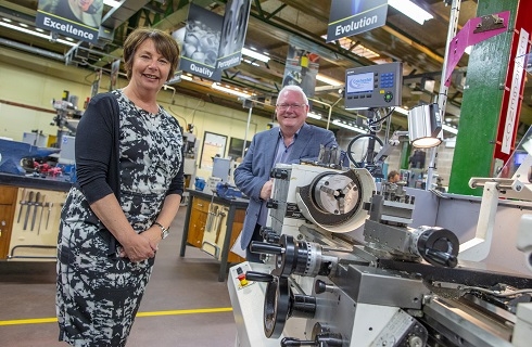 Female and male in engineering workshop