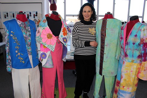 Female student with clothed mannequins