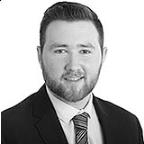 Head shot of male wearing suit