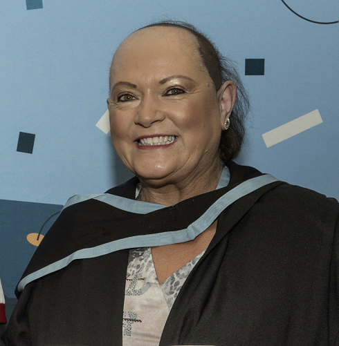 Female in graduation robe