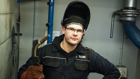 Male student with welder mask