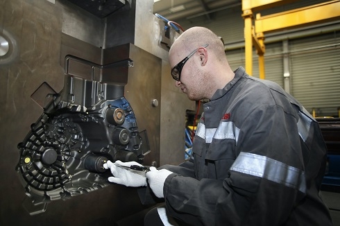 Male working on machinery