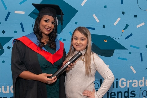 Female graduand pictured with her daughter