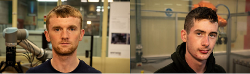 Two male in engineering workshop